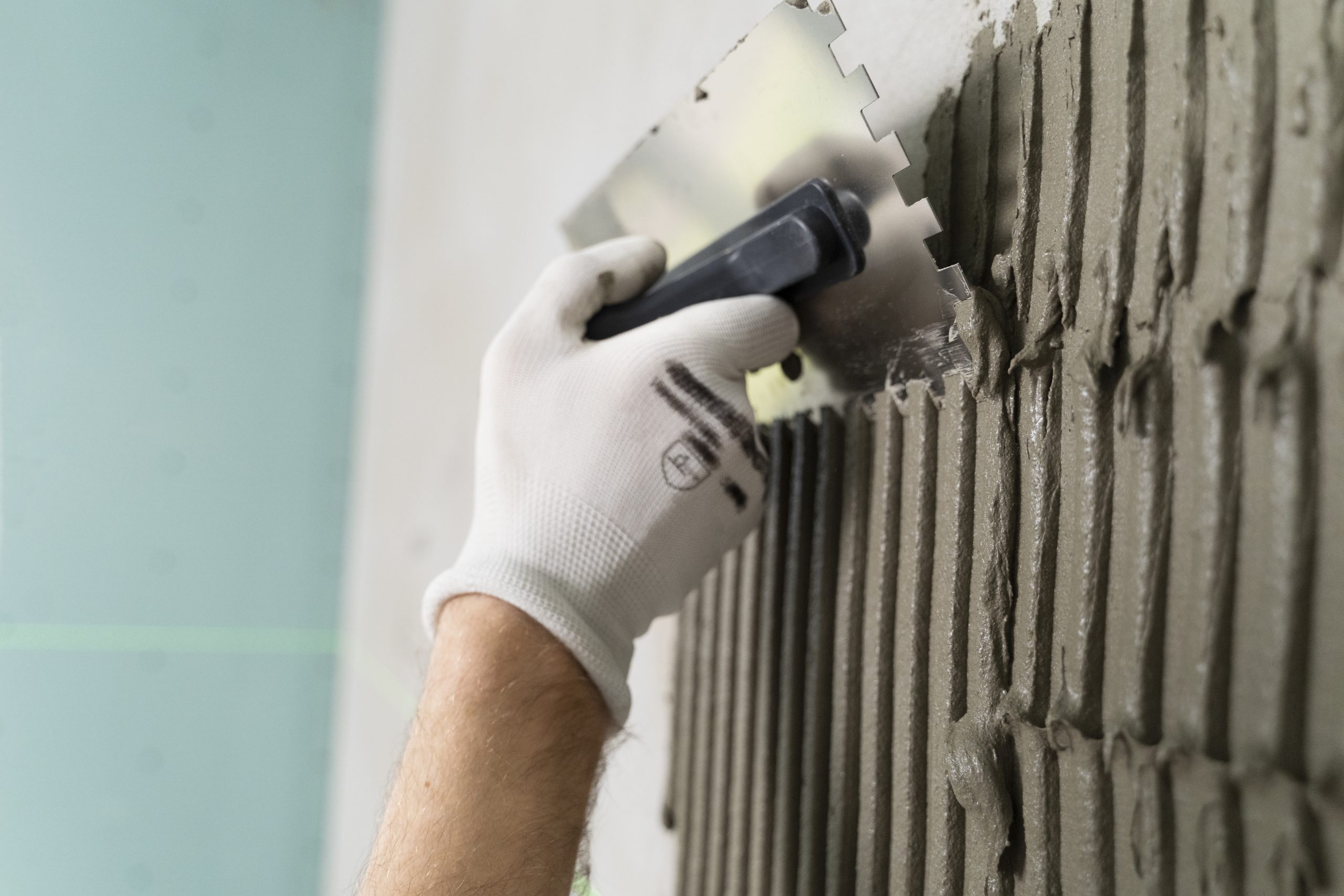 tiler working renovation apartment